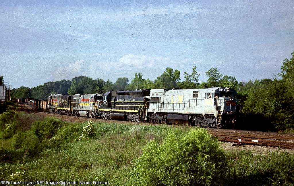 Louisville & Nashville U30C #1560, leading SCL train #329 and SD45 2013, B23-7 5152, GP9 1022 and GP40-2 6618, 